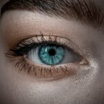 persons blue eyes in close up photography